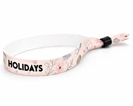 Festivalarmbånd med blomster i lyserøde nuancer